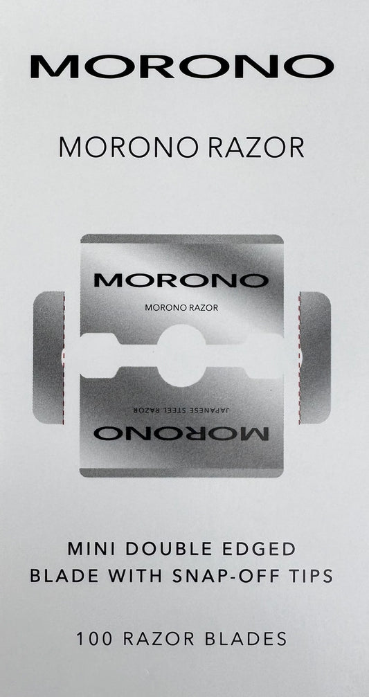 Pack of 100 Morono razor blades on a gray background
